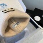 CHANEL New Knit Beanie Hat - Image 15