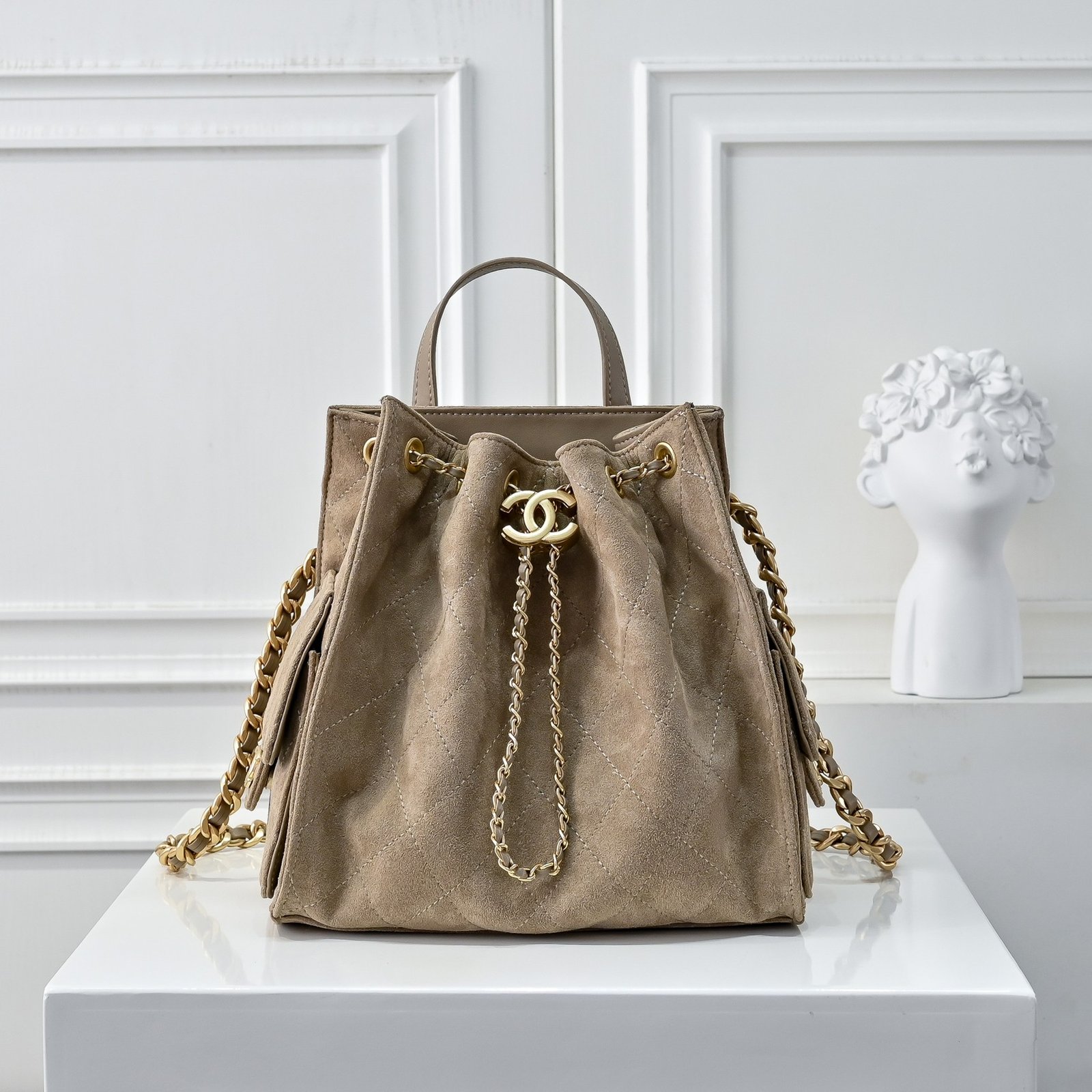 67F63D9F-4DB7-0984-74B1-545A44F3D904 CHANEL 25C 7017 Small Suede Bucket Bag - Image 1