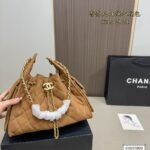 Chanel Suede Drawstring Bucket Hobo Bag - Image 2