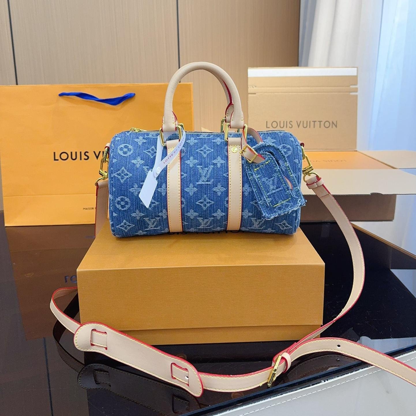 AA9569CE-92FD-72A1-6A6B-4ABDDF83685E Louis Vuitton LV Keepall 25 Denim Handbag Shoulder Bag - Image 1