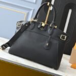 Louis Vuitton The Lock lt MM bag. M11214